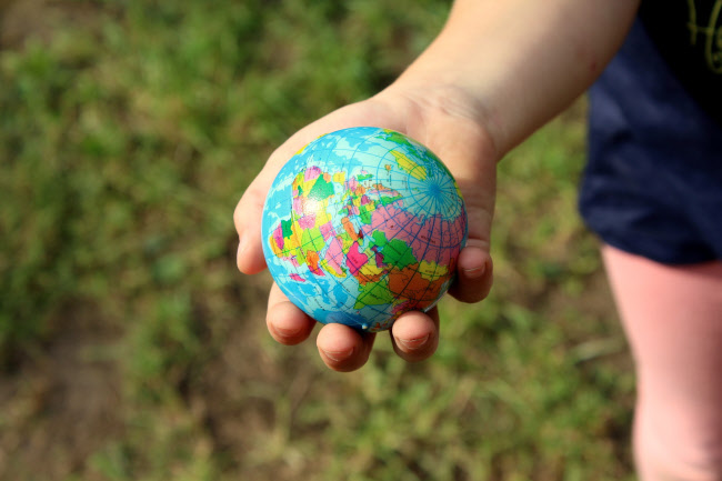 earth in childs hand