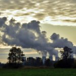 Photo of a power station and a field.