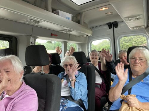 cuppa and chat members on minibus