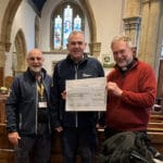 Storrington & Sullington Wardens at St Mary's Church receiving the donation from Revd. Jonathan Swindells