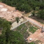 Residents fear the new highway will pave the way for further development projects that will cut into the rainforest Credit: BBC