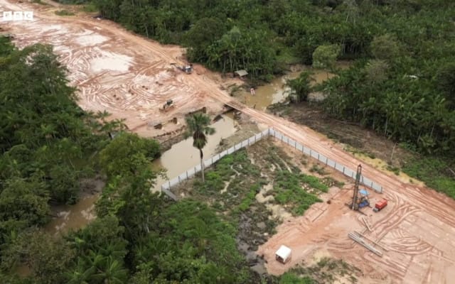 Residents fear the new highway will pave the way for further development projects that will cut into the rainforest Credit: BBC
