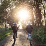 Two girls on bikes photo