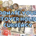 Photo of various coins and bank notes of different countries