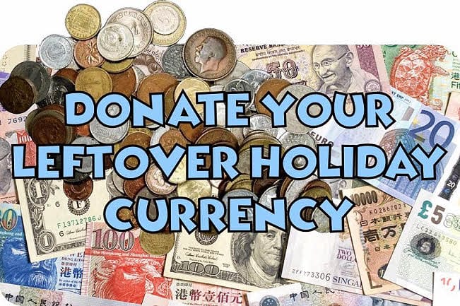 Photo of various coins and bank notes of different countries