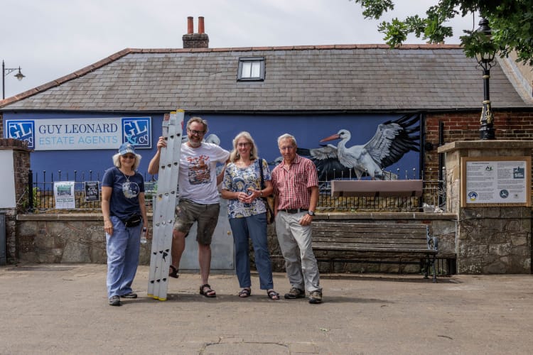 Whte Stork Mural team